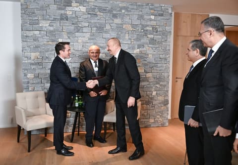 İlham Əliyev Davosda “Brookfield Asset Management” şirkətinin prezidenti ilə görüşüb