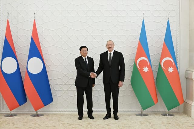 Official welcome ceremony held in Baku for President of Laos