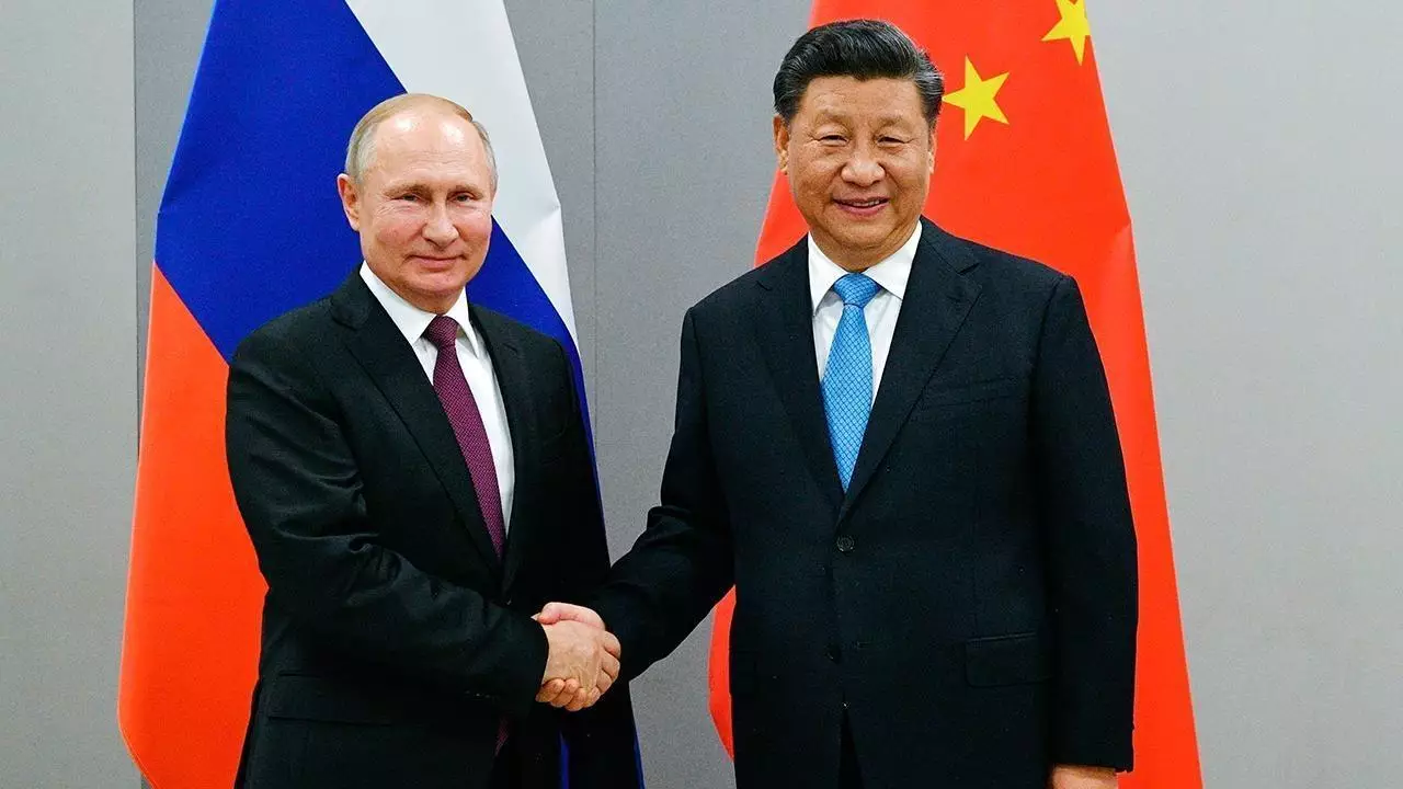 Rusiya prezidenti ilə Çin sədrinin görüşü başlayıb